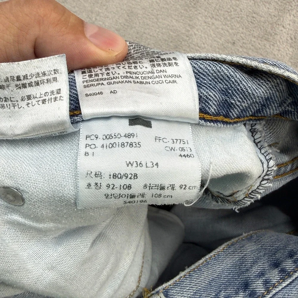 Levi's 550 Relaxed Fit Jeans Mens 36x34 Light Wash Blue Denim Tapered Leg Baggy